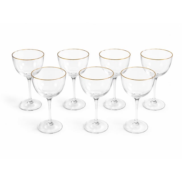 Add timeless elegance to your table with this beautiful set of 8 vintage champagne coupe glasses featuring delicate...