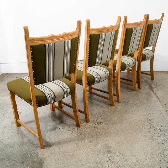 Rarely seen Henning Kjaernulf dining chair set in a striped green and grey fabric. Unmarked examples.