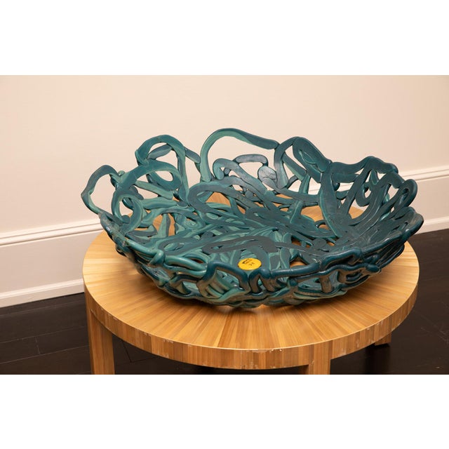 The Tutti Frutti Basket is an iconic example of Gaetano Pesce’s exploration of color, form, and flexible materials....