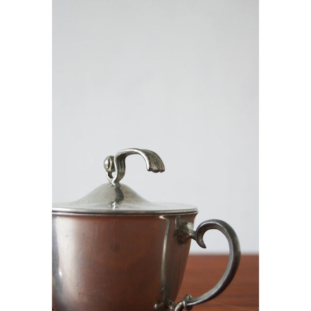 Set designed by Edvin Ollers for Schreuder & Olsson, Stockholm. Made of pewter in the Swedish grace style, which is the...