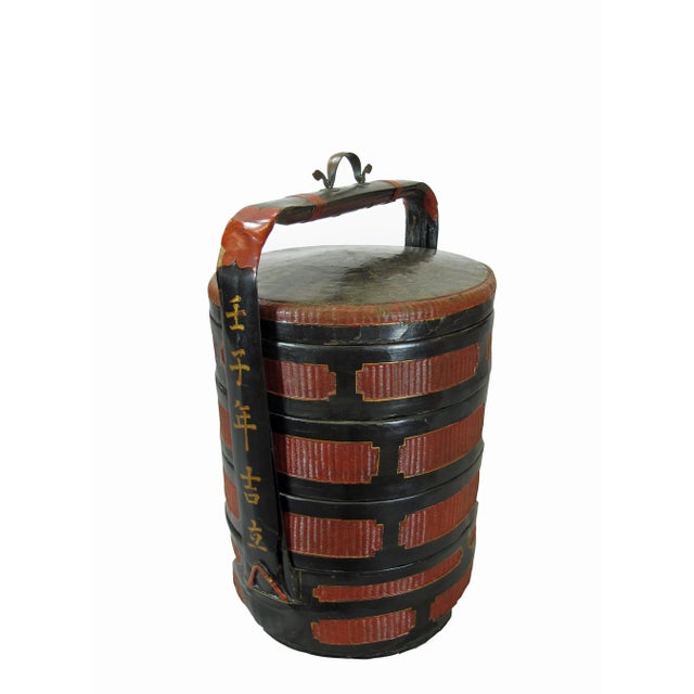 This exotic bamboo basket was used as a container with 4 separate compartments to transfer the dishes by the owner. The...