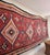 An exceptional large-scale vintage kilim, handwoven in wool and extending to almost five metres in length. The warm...