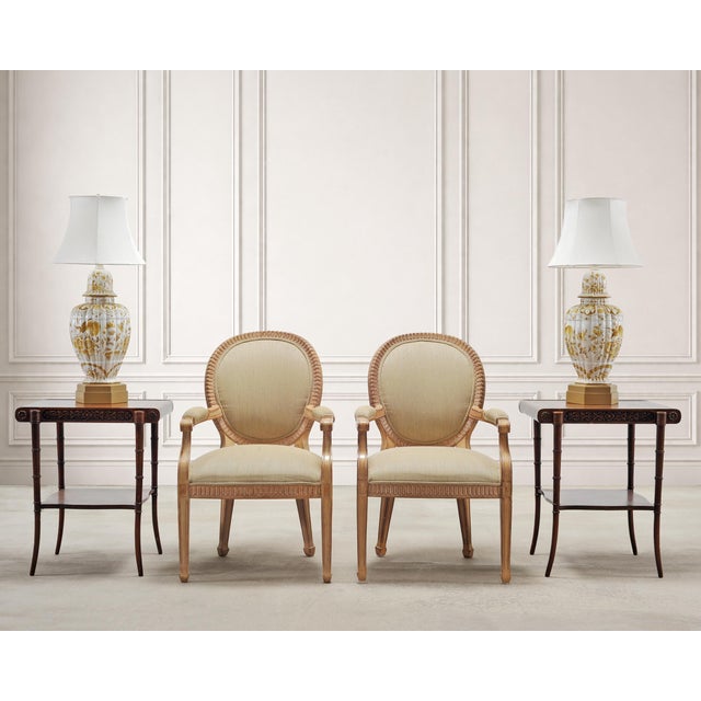 A charming pair of mid-century hand-painted porcelain ginger jar table lamps made by Wilshire House, Beverly Hills, CA....