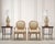A charming pair of mid-century hand-painted porcelain ginger jar table lamps made by Wilshire House, Beverly Hills, CA....