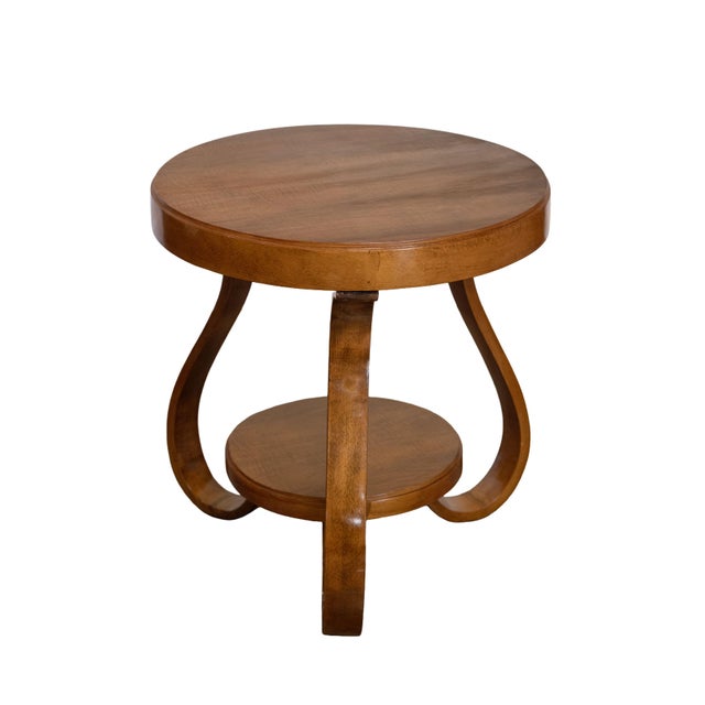 A fine Italian occasional or side table or gueridon from the Art Deco era, featuring the traditional round top over a base...