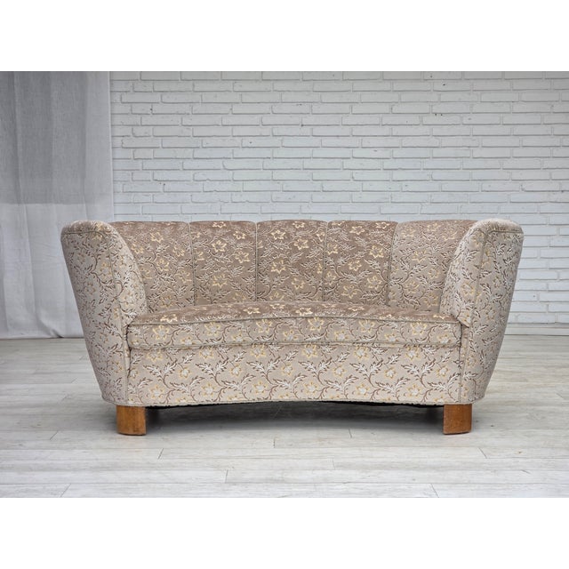 1970s, Danish 2-seater "Banana" sofa. Original light green/gray furniture velour, oak wood legs, springs in the seat....