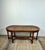 A Louis XVI style "piano bench" in carved walnut with a caned seat, dating from the 1900s/1920s. In very good condition,...