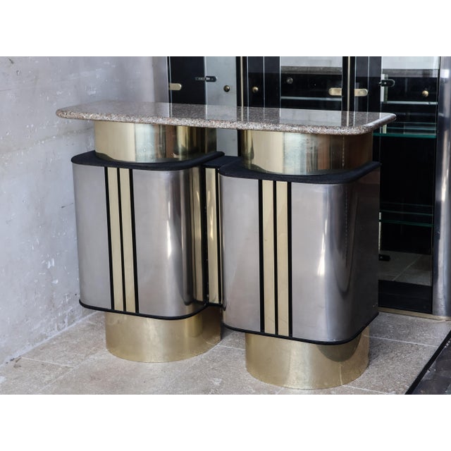 Hollywood Regency bar set, consisting of a freestanding bar and a matching glass back bar with integrated lighting,...