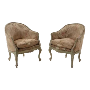 A Pair of Italian Rococo Style Painted and Upholstered Lounge Chairs, 19th Century.