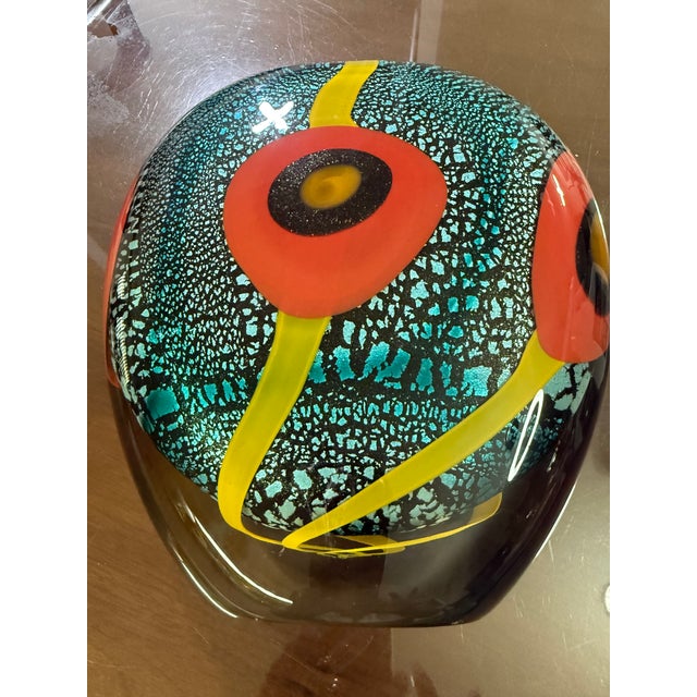 A striking hand-blown studio art glass vase by French master glassblower Allain Guillot, signed and marked “M 06-50.” The...
