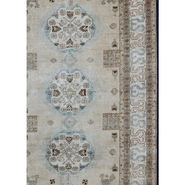Keivan Woven Arts- Earth Tones and light blue Vintage Persian Ardebil Tabriz rug with medallions, rug , country of origin...
