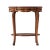 A figured walnut and mahogany banded accent table with inlaid and crossbanded details, the serpentine molded edge oval top...