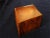 Both the body and lid of this jewelry -- or trinket -- box has been hollowed out of the same block of coconut palm wood so...