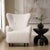 This Stylish Wingback Armchair Blends Classic Design With Cozy Comfort. Upholstered In Ultra-soft White Faux Sheepskin...