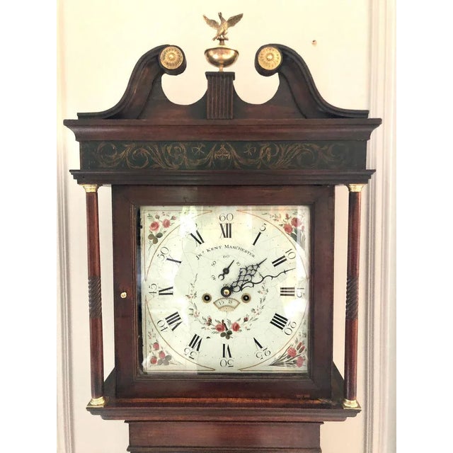 Antique George III oak eight day longcase clock having a well proportioned oak longcase with a painted enamel dial...