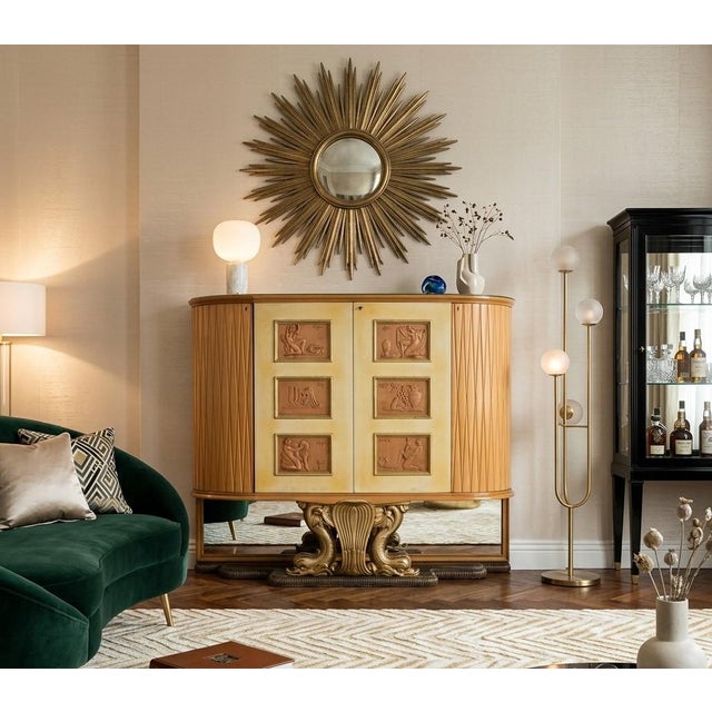 The rationalist elegance of the 1930s finds its ultimate expression in this imposing bar cabinet by Osvaldo Borsani, a...