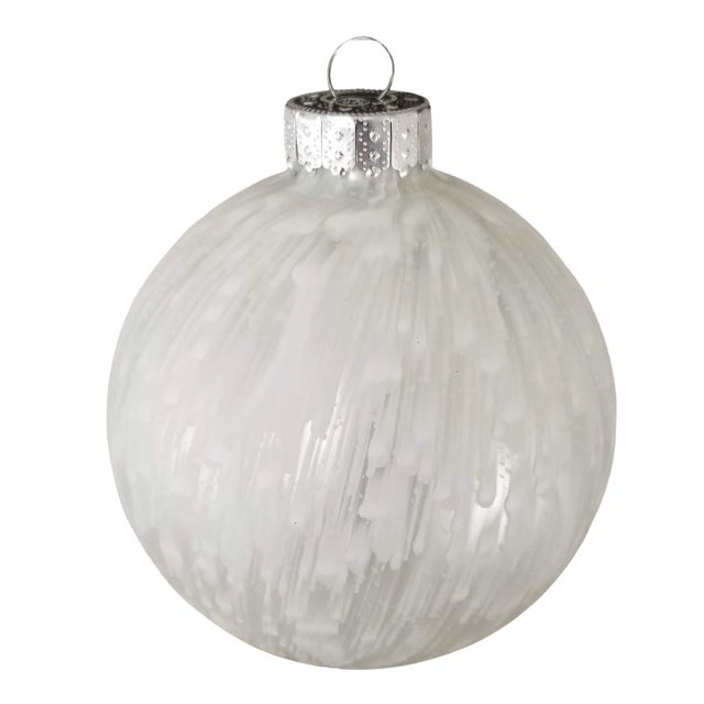 Large hand painted glass Christmas ornaments in silver and white with a satin finish. Hand painting creates uniquely...