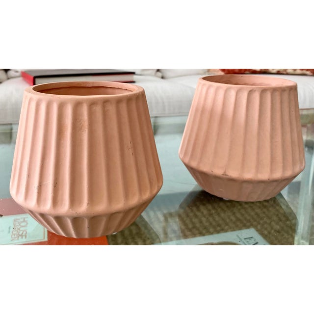 Beautiful pair of 1970s modern natural matte terra cotta cachepots. Nice detail work on the terra cotta. Great conditions...