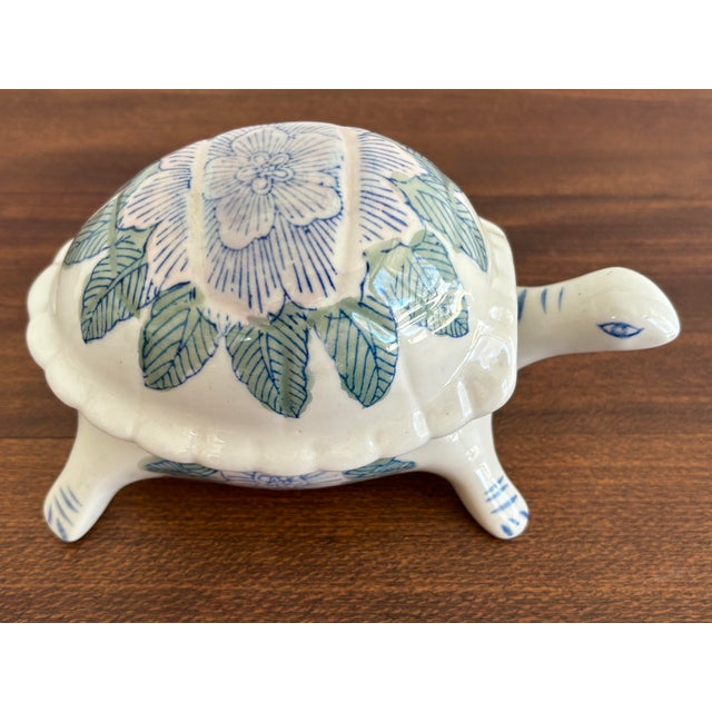 1980s porcelain lidded turtle box, great for hiding necessities like staples or rubber bands. Beautifully painted by hand....