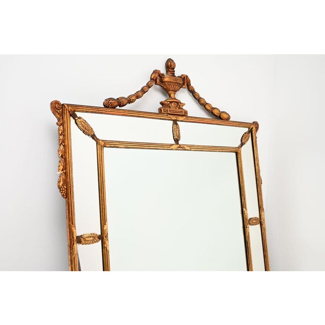 A large, beautiful and very high quality antique Adam Style giltwood mirror in gilt wood and gesso. This was made in...