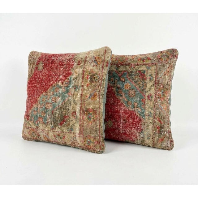 This beautiful 24'' x 24'' pillow cover set was made from authentic Turkish rug pieces. Bright colors of wool adorn the...