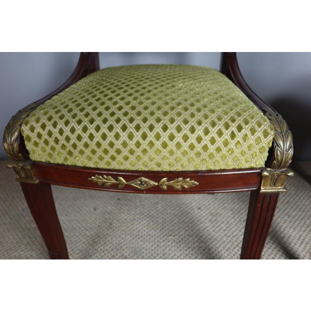 Pair of mahogany chairs with openwork backs and decorated with gilded bronzes. Very good condition. We have a pair of...