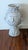 Oyster white vase, with face of a woman on one side and face of a man on the other side. unknown age. height 19.5", widest...