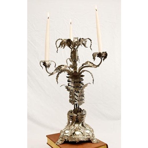 Fine three branch Sheffield silver plate candelabra in silvered metal with highly decorative foliate design. Circa 1880....