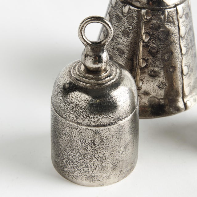 Finished in a vibrant silver, these old fashioned cast aluminum historic shapes are actual functioning bells. Place atop a...