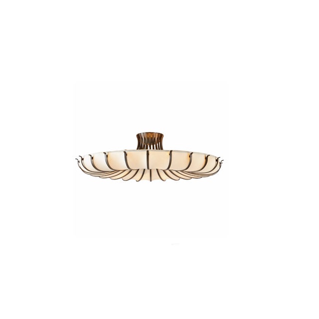 A jellyfish-inspired steel armature finished in English bronze creates the visual illusion of depth. Accented in waves of...
