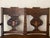 Antique solid oak two-seat settle with carved back splats and original dark finish. Manufactured in Grand Rapids,...