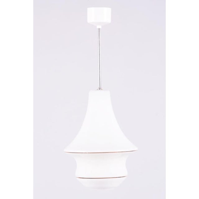 This elegant pendant chandelier from 1940s Czechoslovakia represents a stylish transition between the decorativeness of...
