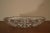 Beautiful oval crystal serving bowl Etched starburst designs surround the bowl Bowl has the ribbed edge on the surface edge