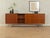 Classic sideboard by BBM Bjerringbro from the 1960s. Corpus in teak veneer with six drawers, two sliding doors, two...