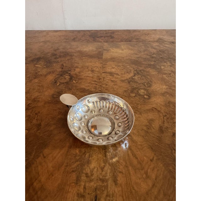 Elegant quality antique Victorian French silver wine taster, having a quality silver hallmarked wine taster embossed with...