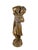 A charming mid-20th-century figurative sculpture by ESCO Products of New York, depicting a young fruit bearer or harvest...