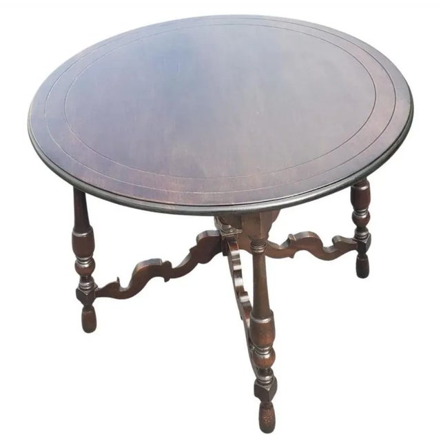 Well maintained 1930s Edwardian Walnut Center Table or Tea Table in great condition. Measures 28 inches in diameter and...