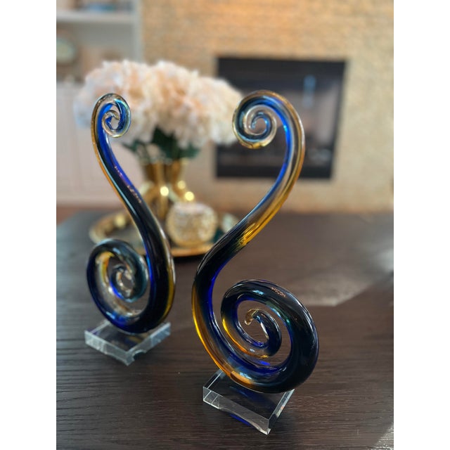 Set of 2 colored blue clear gold glass sculptures 12” Tall 6” wide 3” deep