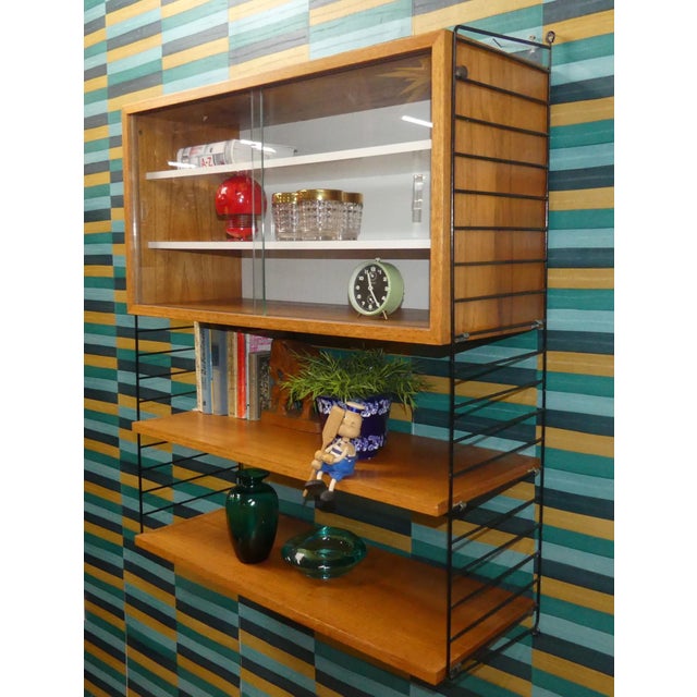 Mid-Century Modern Teak String Shelving Unit with Display Cabinet and Black Ladders by Kajsa & Nils Nisse Strinning for String, Sweden, 1960s For Sale - Image 4 of 10