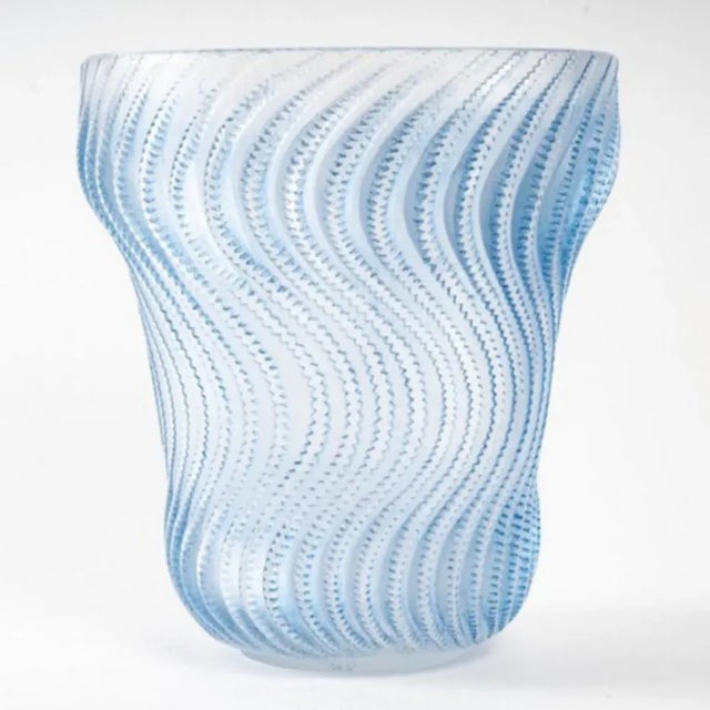 René Lalique (1860-1945) Vase "Actinia" model created in 1934, not resumed after 1947. In pressed molded glass and blue...