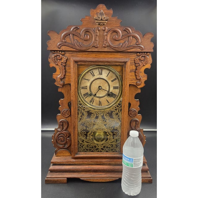 This is an authentic, antique 8-day "Maine Line" striking mantel clock manufactured by the New Haven Clock Co. of New...