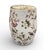this elegant ceramic garden stool, Featuring a classic drum-shaped silhouette, this piece is adorned with a delicate,...