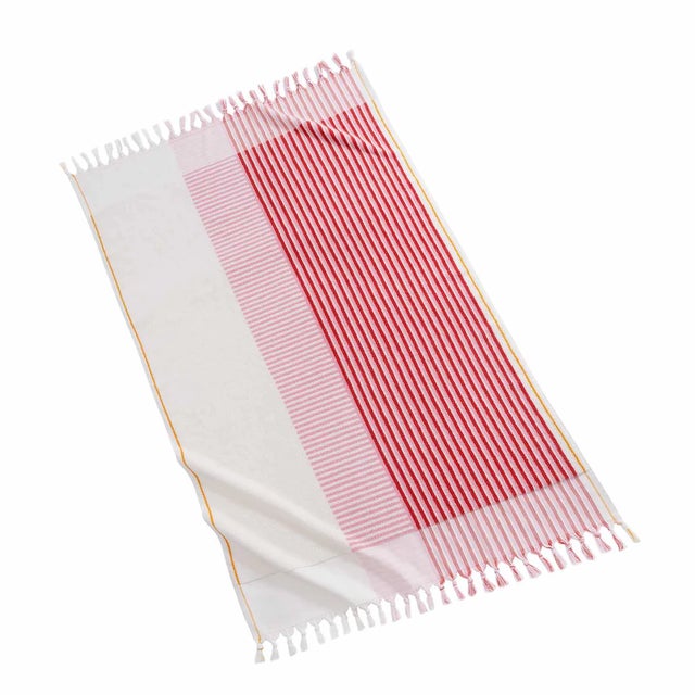 A fresh take on classic geometric motifs, our Nomade collection elevates any beach day with its warm color palette and...