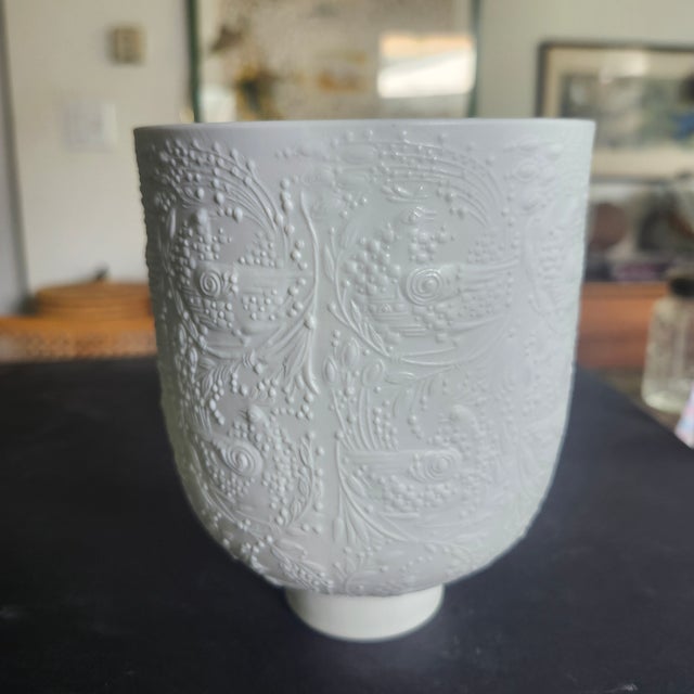 The Rosenthal Bjorn Wiinblad White Porcelain candle holder in the shape of a vase is a vintage piece made in Germany by...