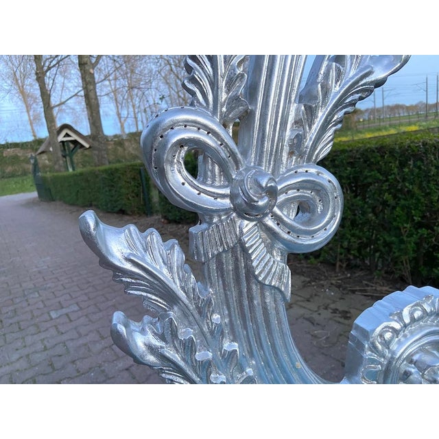 Elevate your interior with this elegant pair of Italian Rococo Revival side chairs, crafted in the 1970s. These chairs...