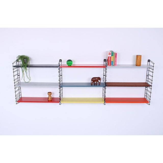 Characteristic and very decorative modular shelving unit from the Netherlands, all genuin Tomado. Heavy quality and...