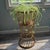 This two-tier vintage 90s plant stand brings organic texture into the room with a distinct hourglass silhouette with...