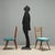 Five Italian-made chairs from the 1950s-60s, featuring a distinctive design reflected in the unique backrest and elegant...