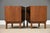 A pair of mid century modern walnut nightstands designed by Kipp Stewart for Directional by Calvin. Professionally...