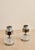 Elegant pair of Italian mid-century table lamps, circa 1960s–1970s, featuring cylindrical pressed glass bases with a...
